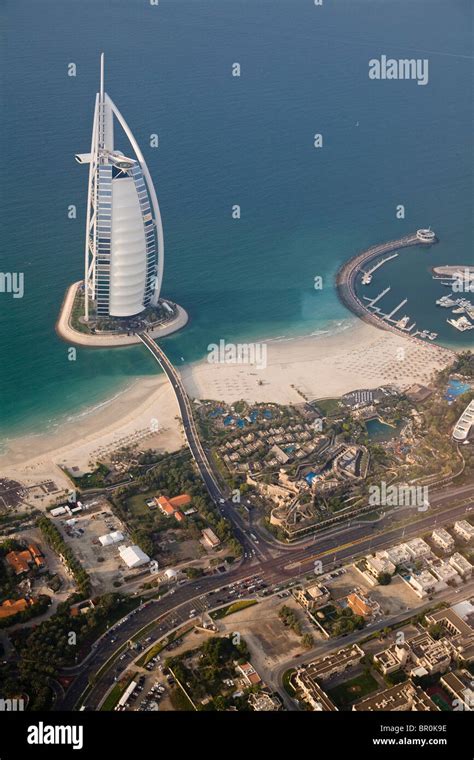 UAE, Dubai. Aerial image of Burj al Arab Hotel and Wild Wadi Water Park ...