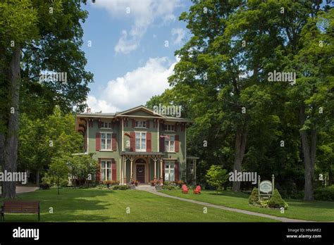 Exterior view of a Cooperstown inn during the summer, Landmark Inn ...