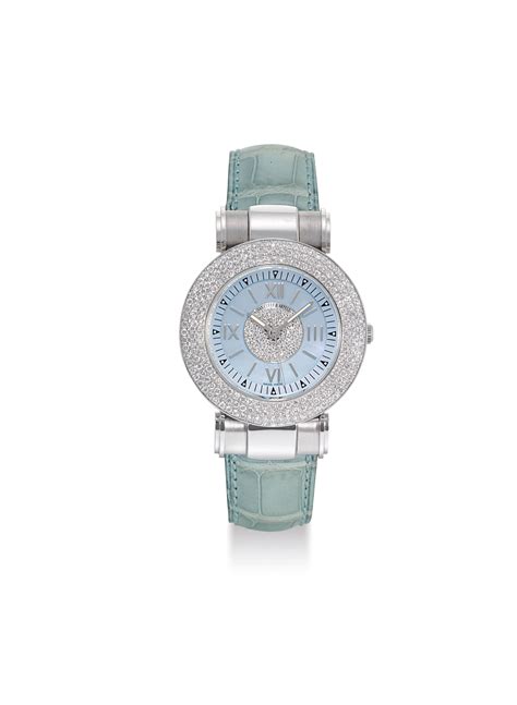 VAN CLEEF & ARPELS. A LADY'S 18K WHITE GOLD AND DIAMOND-SET WRISTWATCH WITH SWEEP CENTRE SECONDS ...