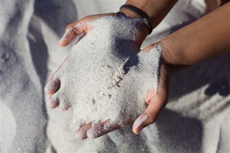 Premium Photo | Woman showing sand