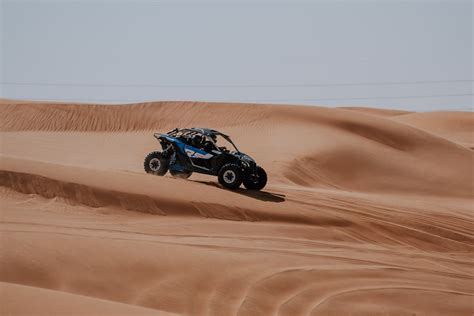 A Dune Buggy on Sand Dunes · Free Stock Photo