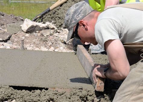 Screeding-Concrete-with-Screed-Board | Dragon Screed