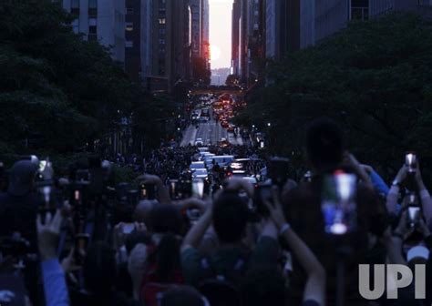 Photo: Manhattanhenge Sunset on 42nd Street in New York ...