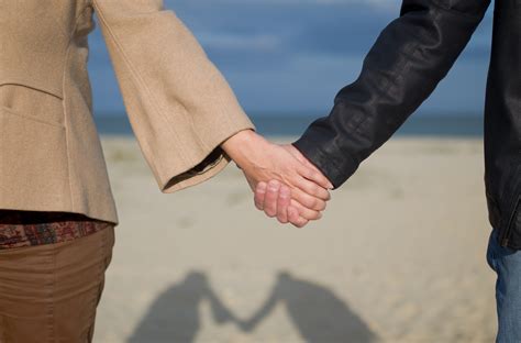 Free Images : hand, beach, sea, people, sky, standing, love, finger ...