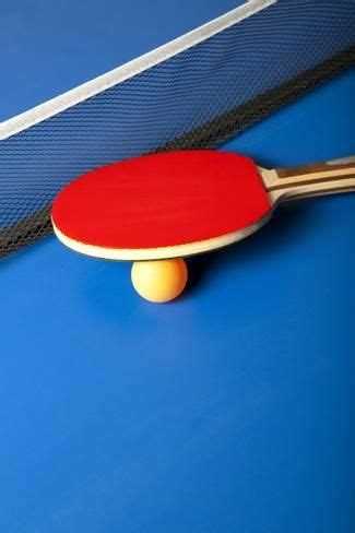 'Table Tennis or Ping Pong Rackets and Balls on a Blue Table' Photographic Print - Andreyuu ...