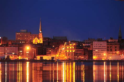 Saint John skyline at night. | Skyline, San francisco skyline, New york ...