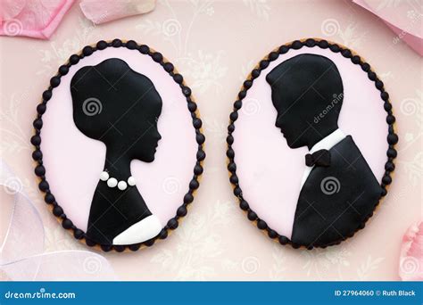 Bride and groom cookies stock photo. Image of frosted - 27964060