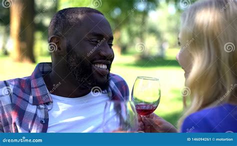 Pleased Couple Enjoying Beverage on Picnic, Romantic Date, Wine Traditions Stock Image - Image ...