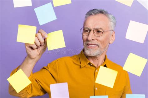 Photo of Agent Elder White Hairdo Man Look Paper Wear Eyewear Yellow Shirt Isolated on Purple ...