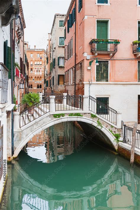 Canal with a bridge in Venice Stock Photo | Adobe Stock