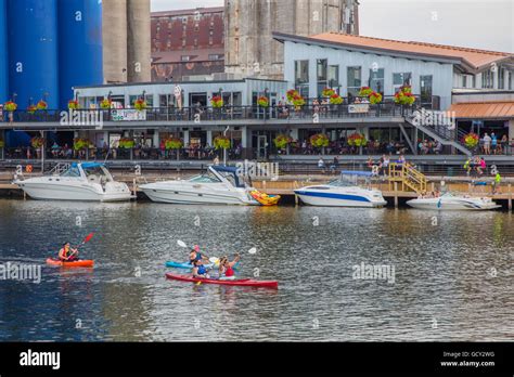 People kayaking past Buffalo Riverworks complex in the Buffalo River in ...