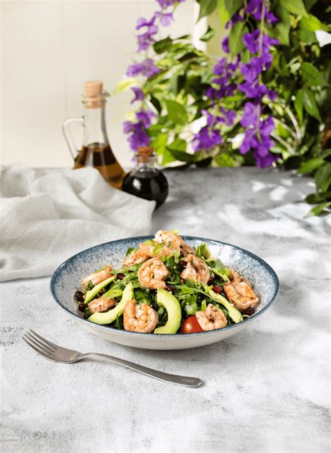 Shrimp Avocado Flavorful salad made with quinoa, baby rocca