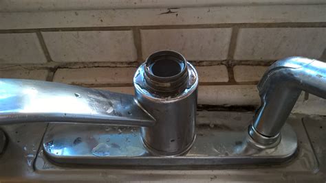Cannot remove the Delta kitchen faucet spigot from the base - Home Improvement Stack Exchange