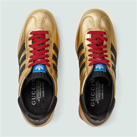 adidas x Gucci wedge Gazelle sneaker in metallic gold leather | GUCCI® US