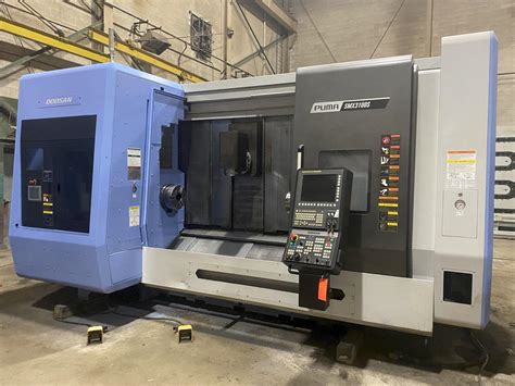 Doosan Puma SMX3100S 7-Axis CNC Lathe, Fanuc 31i, 12″/10″ Chucks, 60.6″ Centers, 4″ Bar Capacity ...