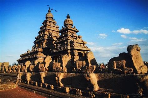 an intricately carved stone structure in the desert