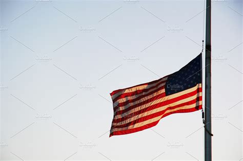 Us flag at half mast photo containing us, united states, and america | Industrial Stock Photos ...