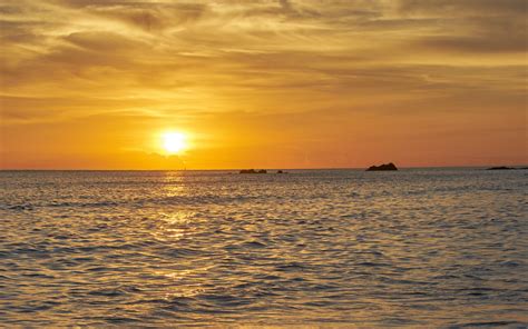 Download wallpaper 3840x2400 sun, sunset, beach, sea, waves 4k ultra hd 16:10 hd background
