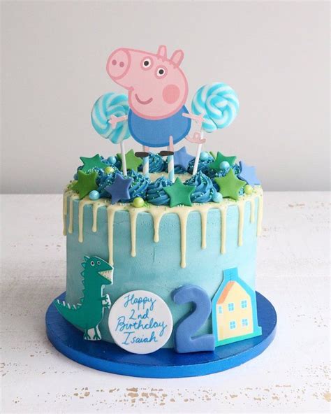 a peppa pig birthday cake with blue icing