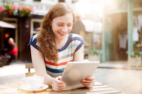 Women Laughing Alone With Tablets: New Stock Image Meme | Time