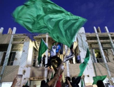 Libya: Gaddafi's green flag raised in Bani Walid after bloody uprising ...