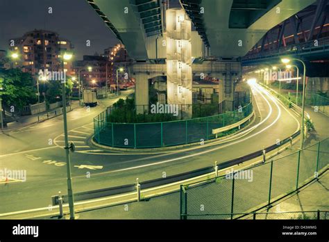 colors of night Tokyo with huge illuminated highway structure Stock Photo - Alamy