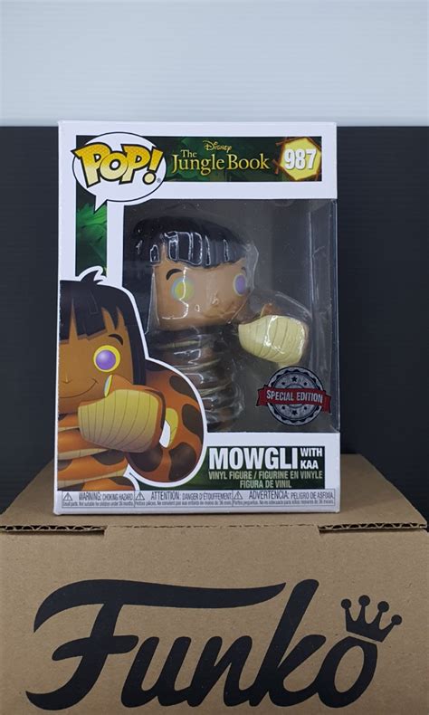 Funko pop! The Jungle Book: #987 Mowgli with Kaa (SE), Hobbies & Toys, Collectibles ...