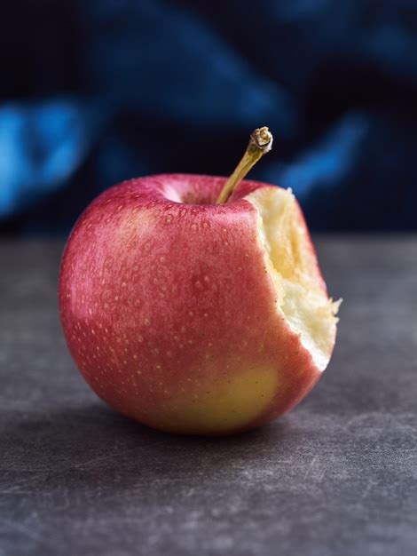 Premium Photo | Close up red apple on table