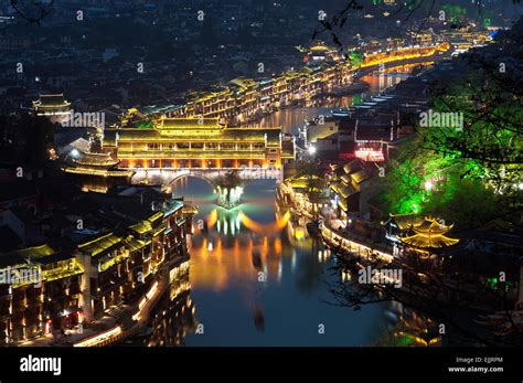 Elevated view of Fenghuang ancient town lit up at night Stock Photo - Alamy