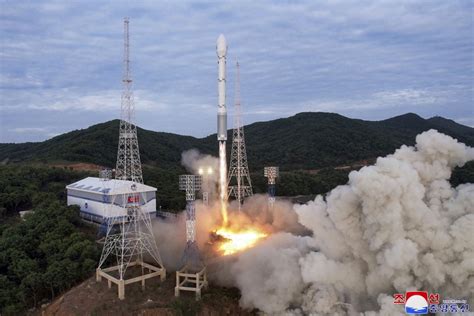 North Korea launches suspected spy satellite, its neighbors say