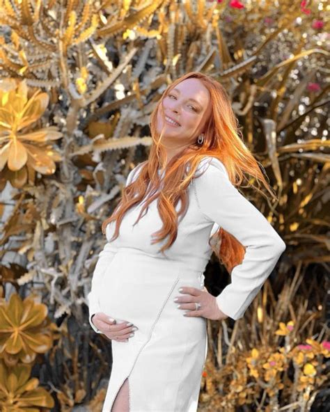 Pregnant Lindsay Lohan shows off baby bump in swimsuit