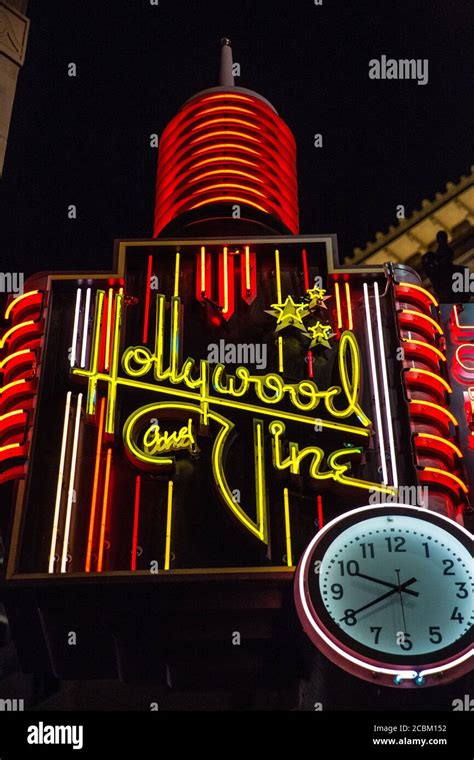 Hollywood neon sign and clock at night, Los Angeles, California, USA ...