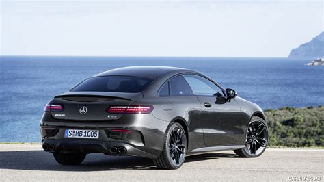 2021 Mercedes-AMG E 53 Coupe (Color: Graphite Grey Metallic) - Rear Three-Quarter | Caricos