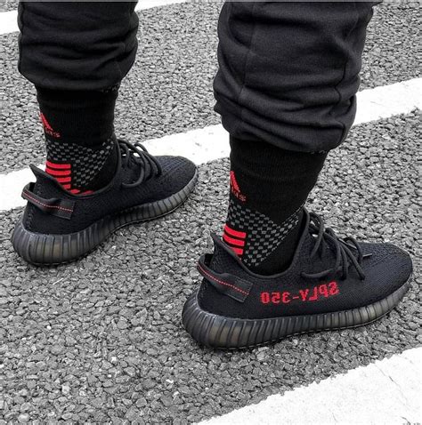 Yeezy bred v2 with long socks | Sneakers fashion outfits, Yeezy womens ...