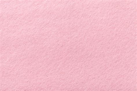 Premium Photo | Light pink matt suede fabric velvet texture of felt,