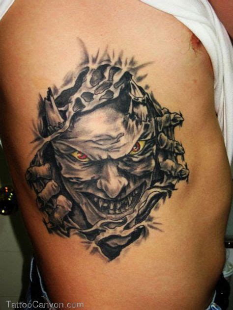 Demon Tattoo On Ribs picture 19002 | Ripped skin tattoo, Demon tattoo, Tattoo skin