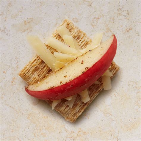 Caramelize sliced apples in butter and brown sugar and top with cheddar cheese on a Triscuit ...
