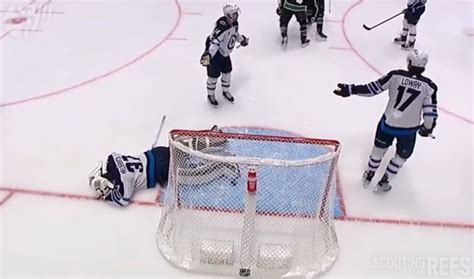 Jets’ Hellebuyck Loses Mask, Allows Goal, Demands Rule Change