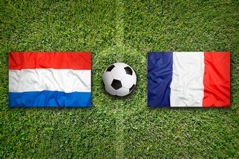 Netherlands Vs France Flags On Soccer Field Stock Photo - Download ...