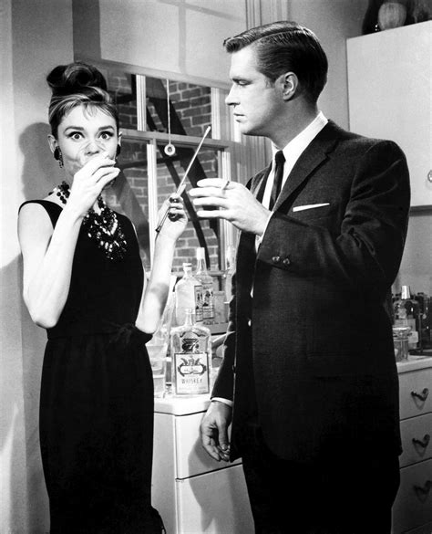 voxsartoria — Drinkies. Audrey Hepburn and George Peppard, 1961.