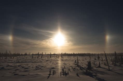 Surreal sun dog phenomenon lights up the sky of western Siberia in ...