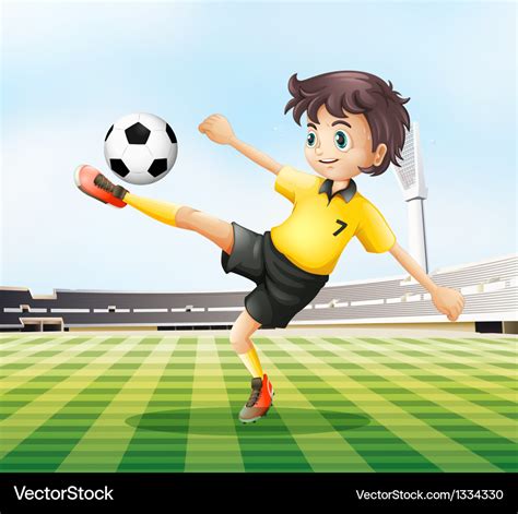 A football player kicking the ball Royalty Free Vector Image