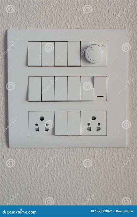 DESIGNER ELECTRICAL SWITCH BOARD WITH Two Way SWITCHES On Laminated Tile Stock Image ...