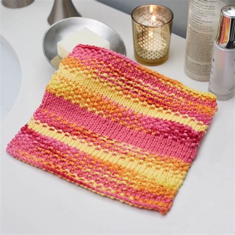 Red Heart Textured Stripes Washcloth | Yarnspirations | Dishcloth knitting patterns, Scrubby ...