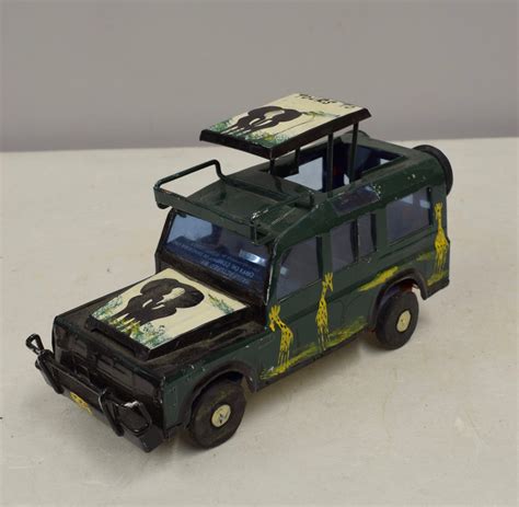 Truck African Safari Recycled Dark Green Tin Truck Pop Up Roof Tanzania ...