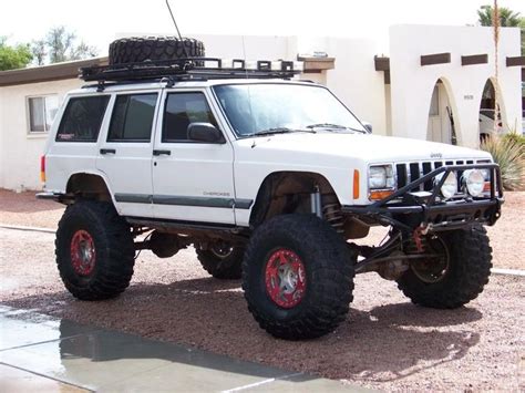 Lifted white jeep cherokee