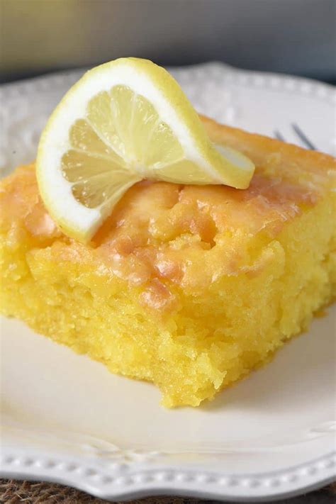 Lemon Poke Cake with Lemon Glaze - Adventures of Mel