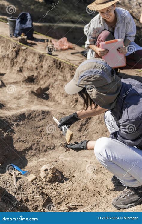 Archaeologist Working at Archaeology Site Stock Photo - Image of ...