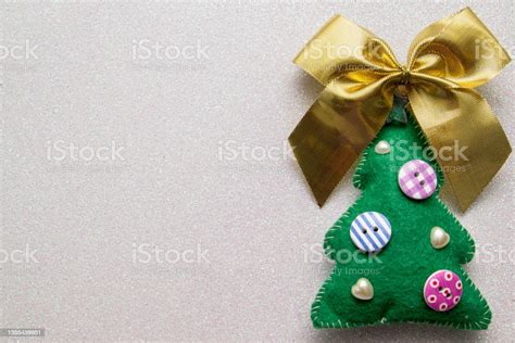 Homemade Christmas Tree Made Of Felt With Bow On White Glitter Background Stock Photo - Download ...
