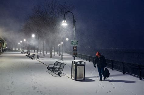 ‘Bomb Cyclone’ Swirls Northward, Bringing Snow and Bitter Cold - The New York Times